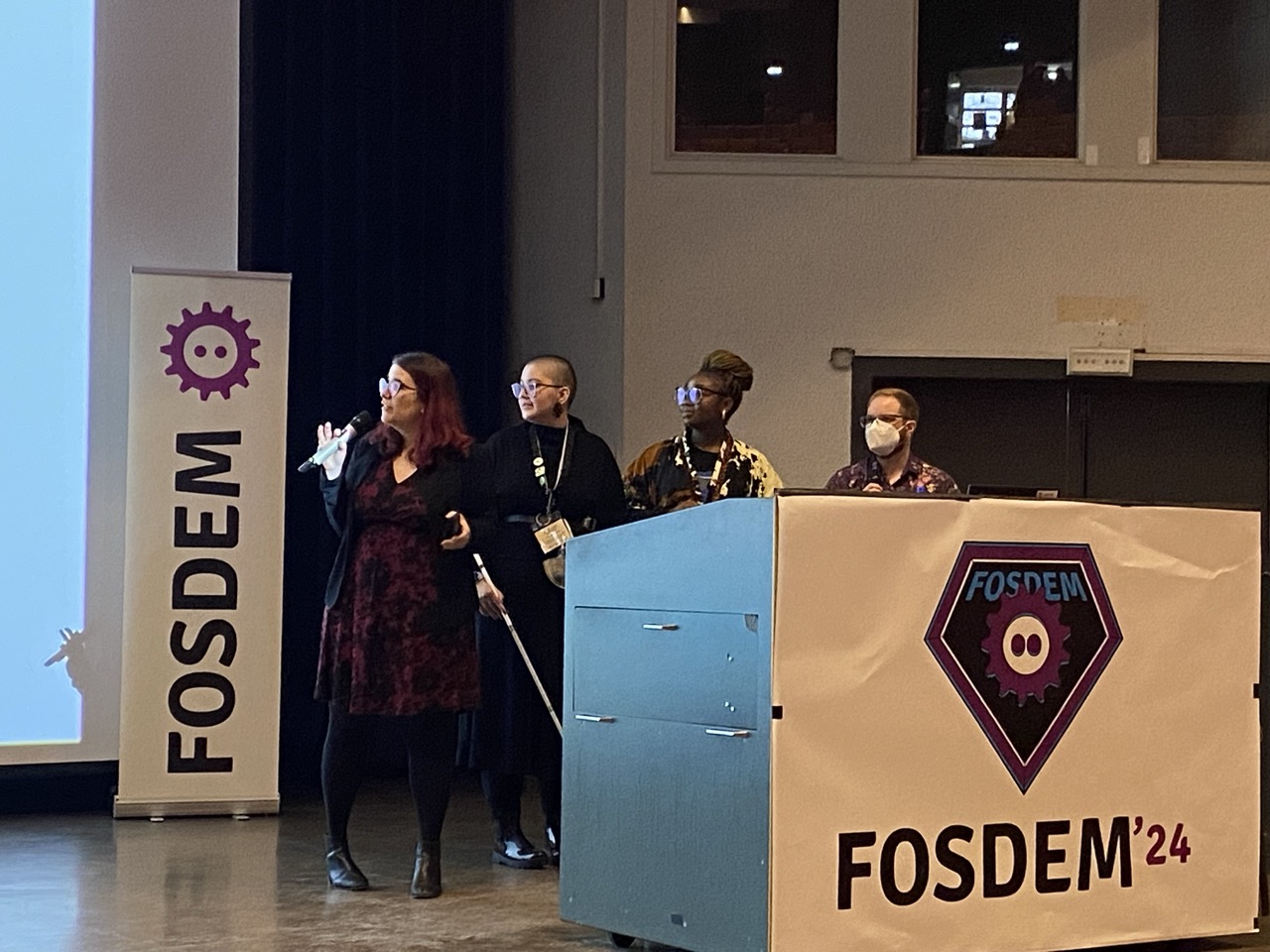 Outreachy organizers deliver their keynote speech at FOSDEM.